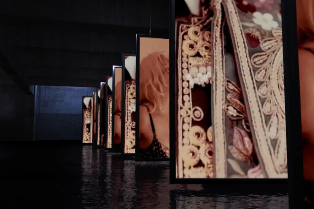 Row of hanging screens with close-up detail frames