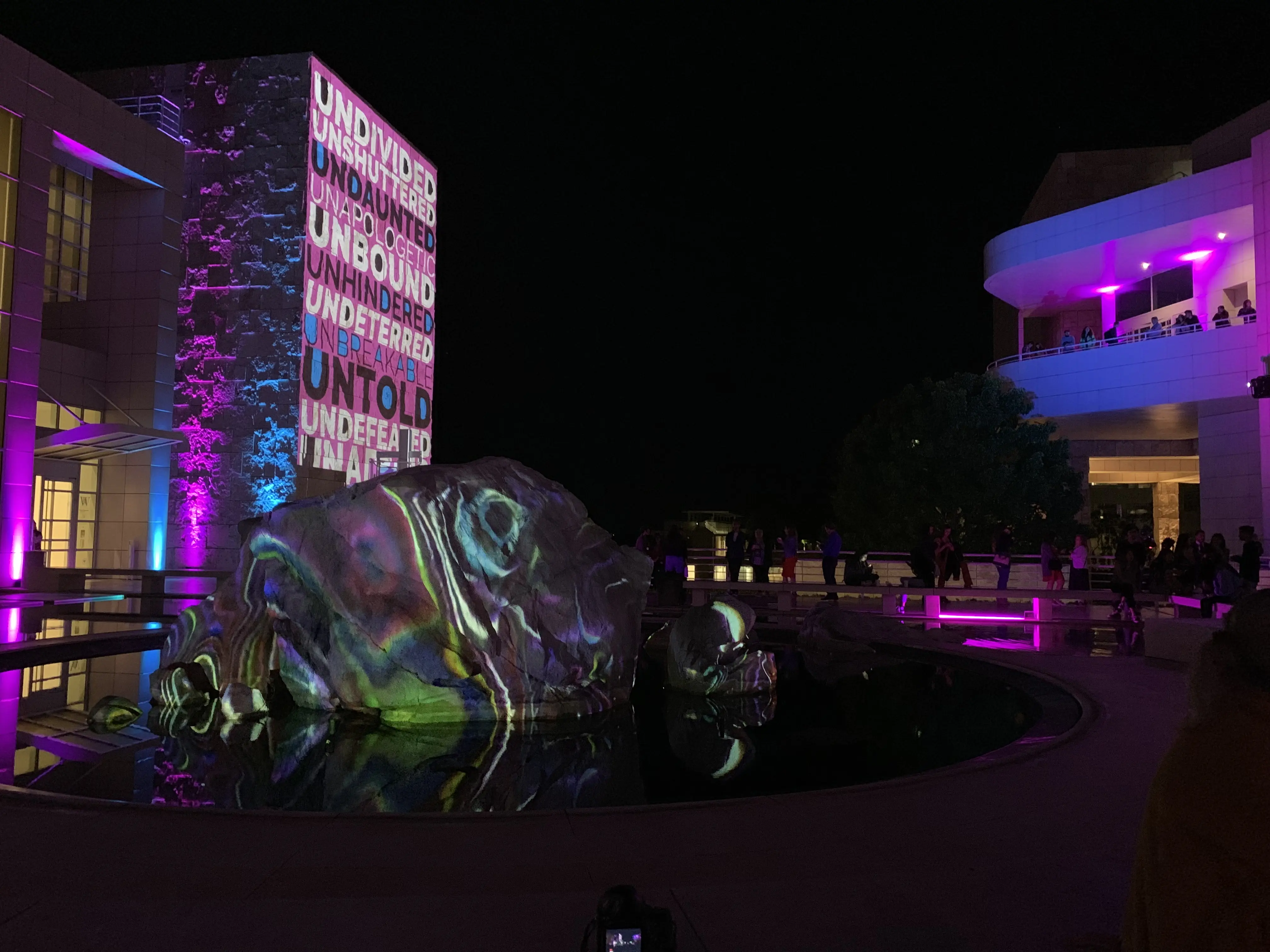 Projection-mapped buildings above the plaza