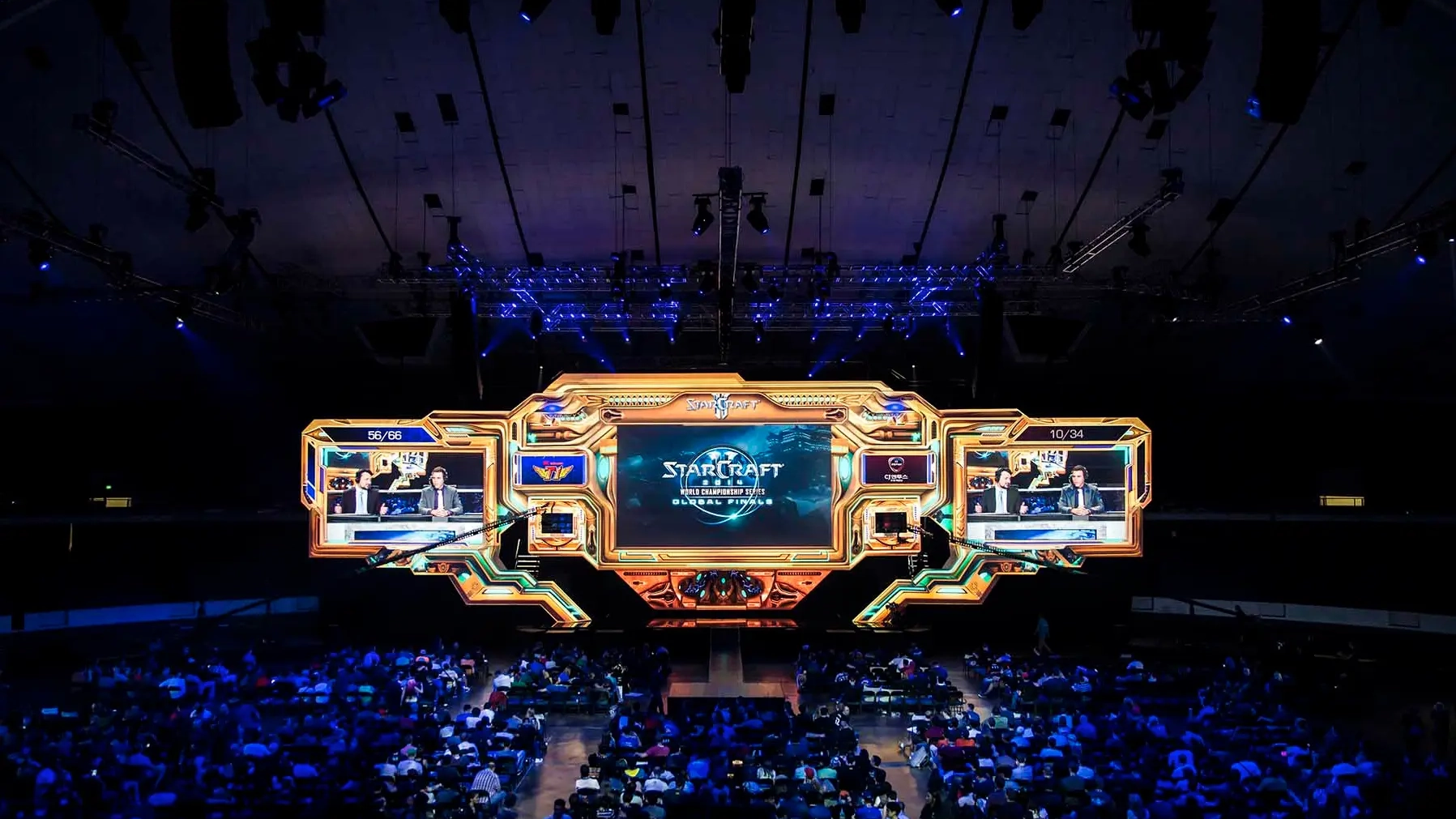 The projection-mapped StarCraft II stage lit in the Protoss look at the Anaheim Convention Center Arena